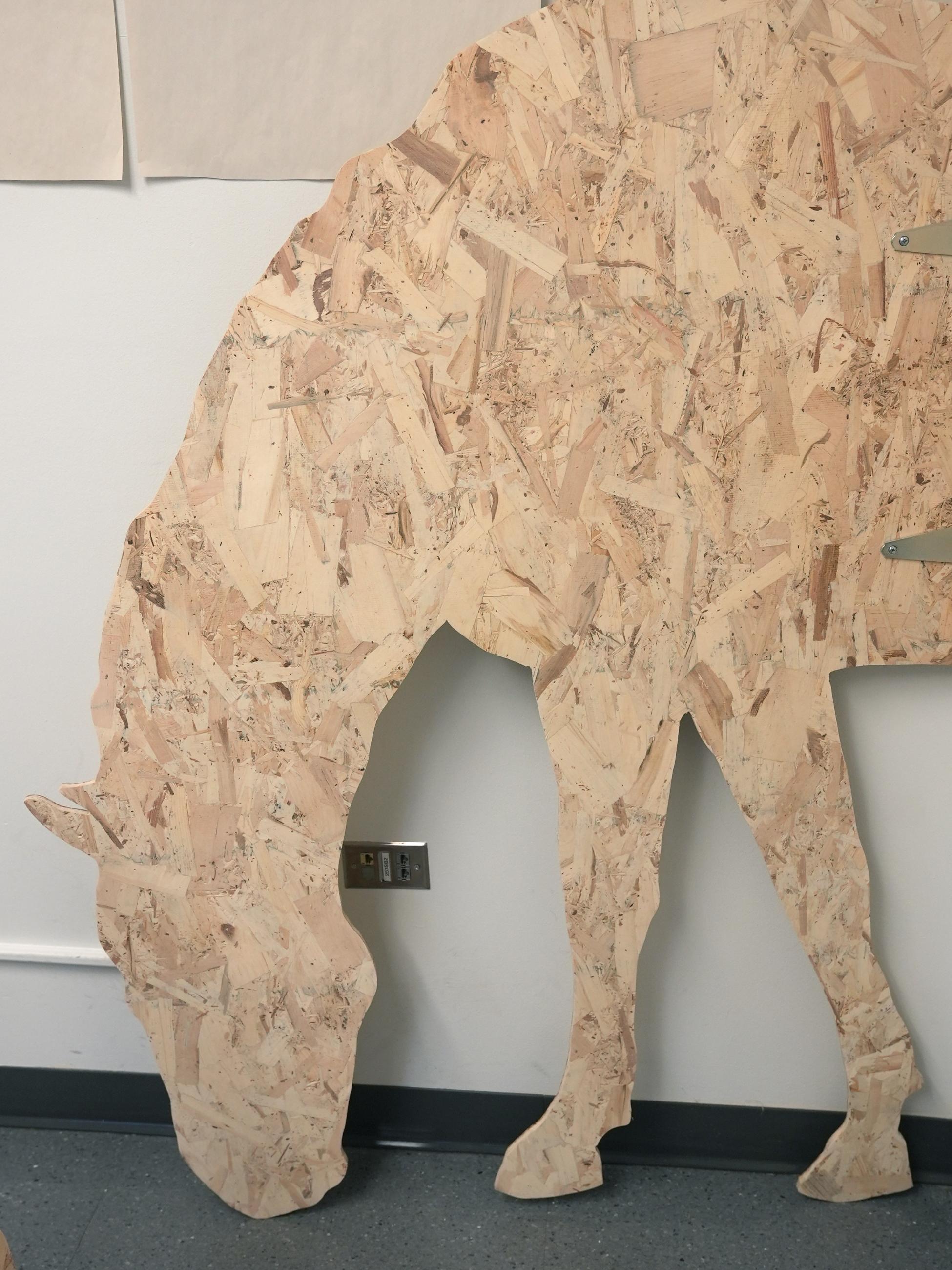 life-size silhouette of horse made from plywood