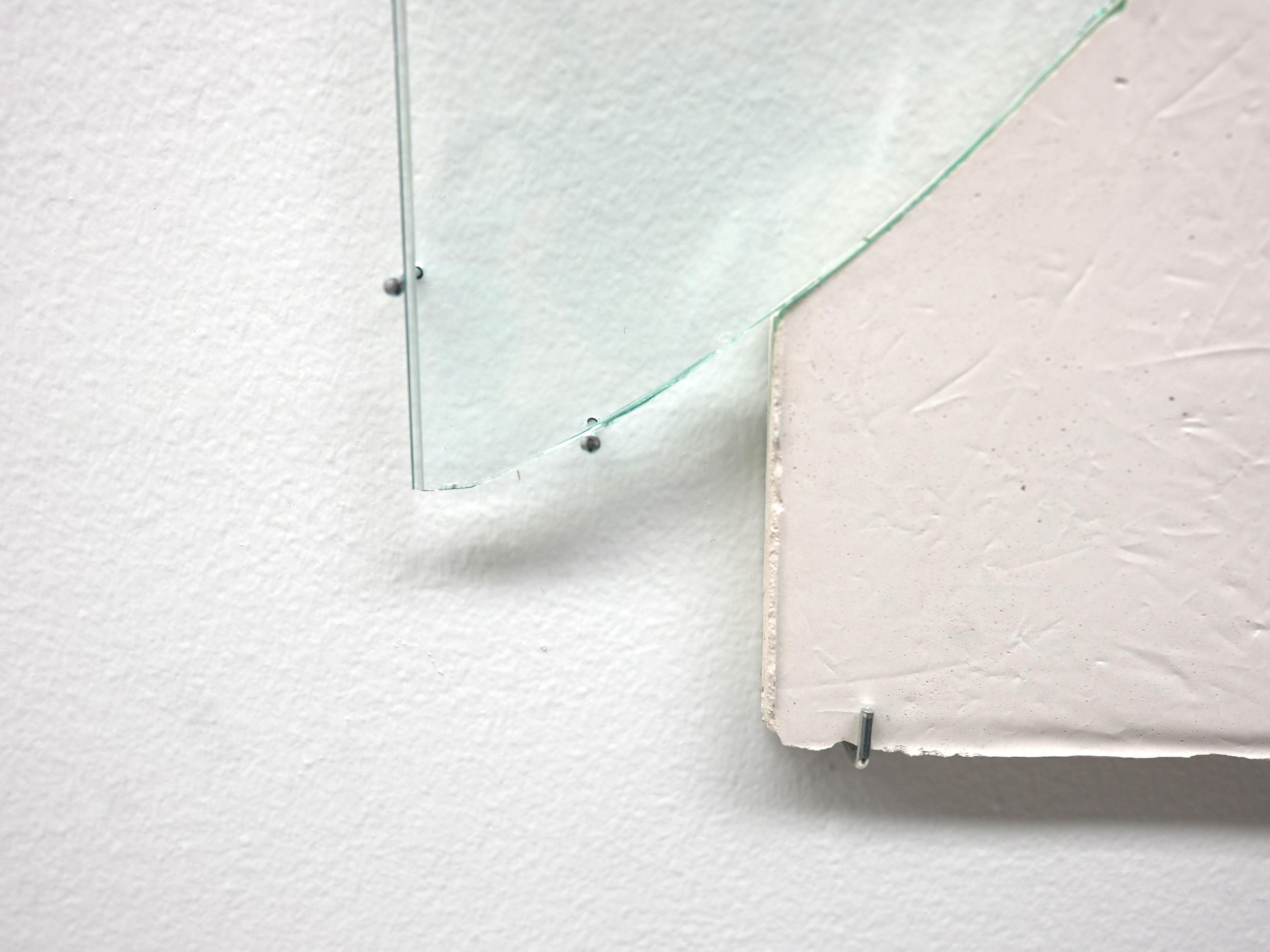 Detail of glass insert on wooden plank sculpture