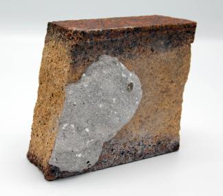 broken brick with red facing and iron flecks