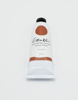 Small paint tube showing rust red paint color