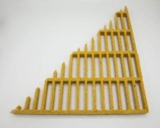yellow metal grid cut into a pyramid shape