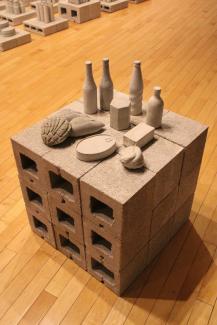 Ceramic molded objects on cinderblocks